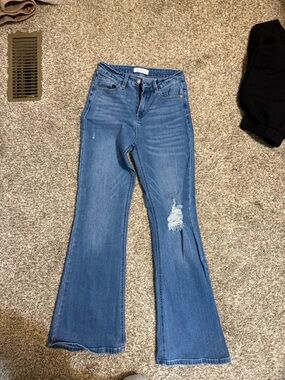 High-Rise Blue Bootcut Jeans with Knee Distress